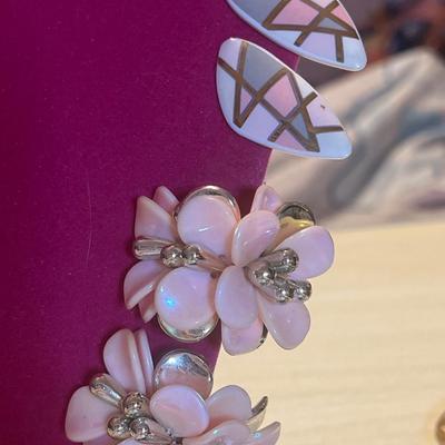 Golden toned pink clip ons