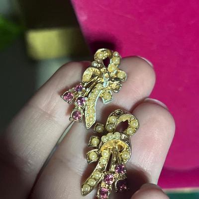 Gold toned ribbon clip on earrings