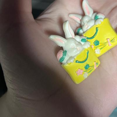 Gold toned ribbon clip on earrings