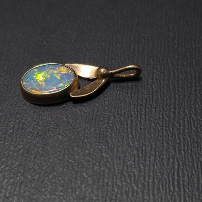 A pair of 14k Earrings with no posts / hooks and a beautiful necklace pendant