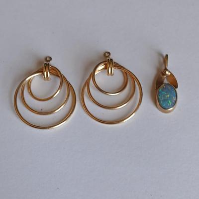 A pair of 14k Earrings with no posts / hooks and a beautiful necklace pendant