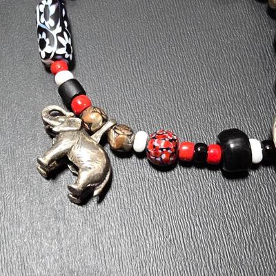 Red and Blue beaded bracelets with elephant charm and trade beads