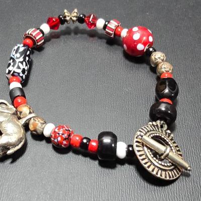 Red and Blue beaded bracelets with elephant charm and trade beads