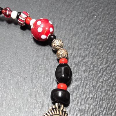 Red and Blue beaded bracelets with elephant charm and trade beads