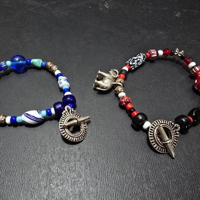 Red and Blue beaded bracelets with elephant charm and trade beads