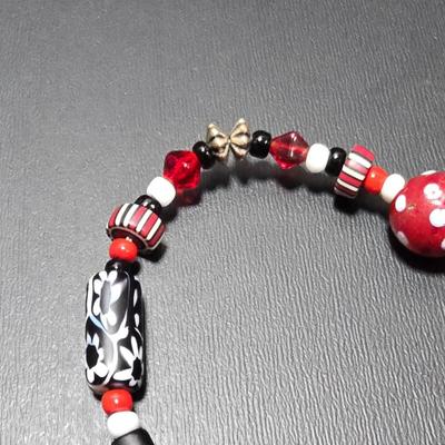 Red and Blue beaded bracelets with elephant charm and trade beads
