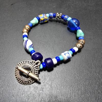 Red and Blue beaded bracelets with elephant charm and trade beads