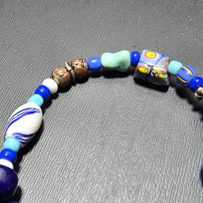 Red and Blue beaded bracelets with elephant charm and trade beads