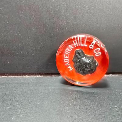 Vintage glass Madeira Hill & Co. paperweight and an Advertising Trade Adairack Mark Glass paperweight