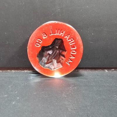 Vintage glass Madeira Hill & Co. paperweight and an Advertising Trade Adairack Mark Glass paperweight