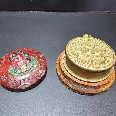 Neptune Meter Co Tribute water meter replica paperweight and a Babbitt metal /lead paperweight