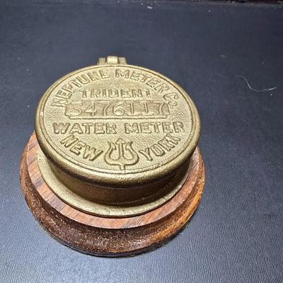 Neptune Meter Co Tribute water meter replica paperweight and a Babbitt metal /lead paperweight