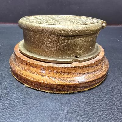 Neptune Meter Co Tribute water meter replica paperweight and a Babbitt metal /lead paperweight