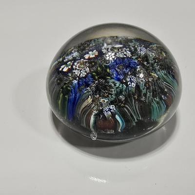Two decorative glass paperweights - floral and art deco