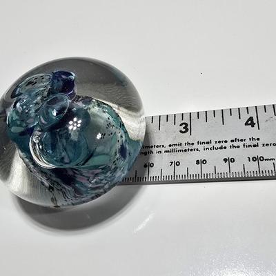 Two decorative glass paperweights - floral and art deco