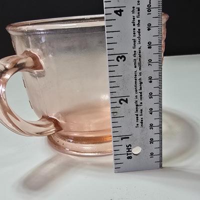 Pink depression glass divided dish, platter, and Juice reamer with measuring glass cup