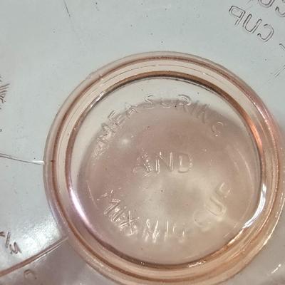 Pink depression glass divided dish, platter, and Juice reamer with measuring glass cup
