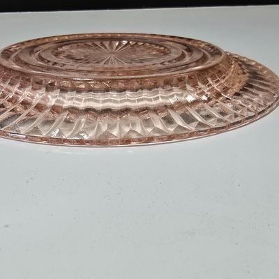 Pink depression glass divided dish, platter, and Juice reamer with measuring glass cup