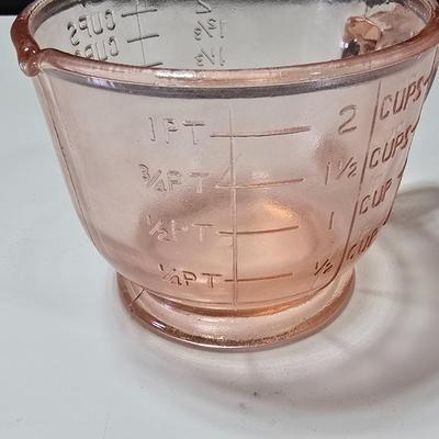Pink depression glass divided dish, platter, and Juice reamer with measuring glass cup