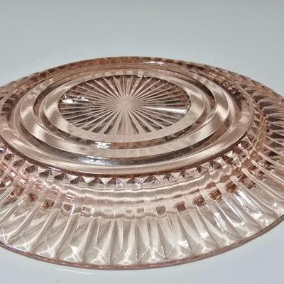 Pink depression glass divided dish, platter, and Juice reamer with measuring glass cup