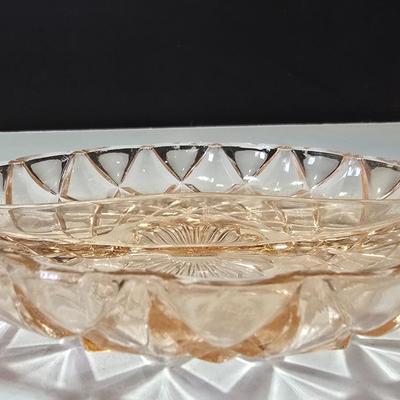 Pink depression glass divided dish, platter, and Juice reamer with measuring glass cup