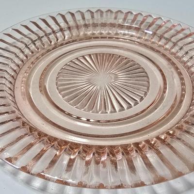 Pink depression glass divided dish, platter, and Juice reamer with measuring glass cup