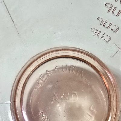 Pink depression glass divided dish, platter, and Juice reamer with measuring glass cup