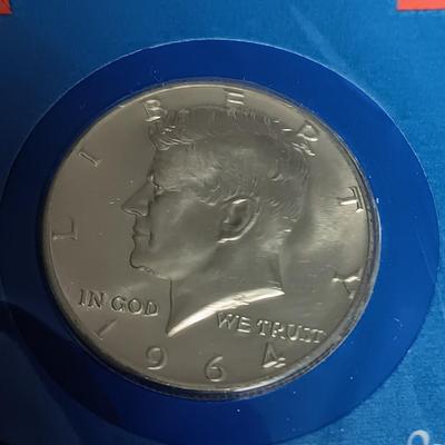 PAST PRESIDENTS FIRST DAY OF ISSUE AND PROOF .900 SILVER DOLLAR, 1964 SILVER HALF DOLLAR AND A GEORGE BUSH MEDAL