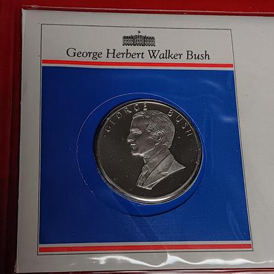 PAST PRESIDENTS FIRST DAY OF ISSUE AND PROOF .900 SILVER DOLLAR, 1964 SILVER HALF DOLLAR AND A GEORGE BUSH MEDAL
