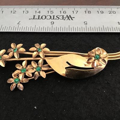 Large Gold Tone Green Rhinestone Brooch
