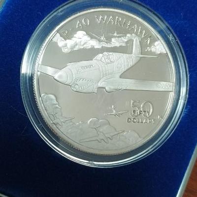P-40 WARHAWK $50 SILVER PROOF COIN, WWII FIRST DAY OF ISSUE & HER0ES OF DESERT STORM