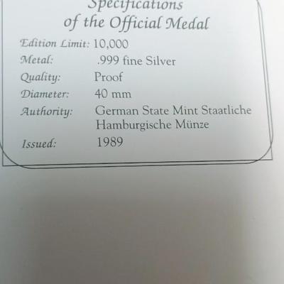"THE OPENING OF THE BERLIN WALL" .999 SILVER MEDAL AND US HALF DOLLAR AND GERMAN COIN