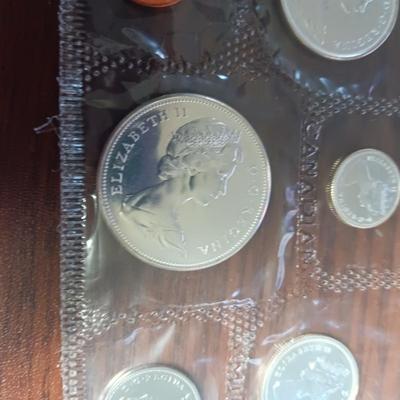 A VARIETY OF PROOF FOREIGN COINS