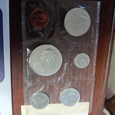 A VARIETY OF PROOF FOREIGN COINS