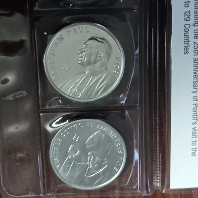 A VARIETY OF PROOF FOREIGN COINS