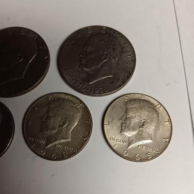 TWO EISENHOWER DOLLARS AND 3 KENNEDY HALF DOLLARS