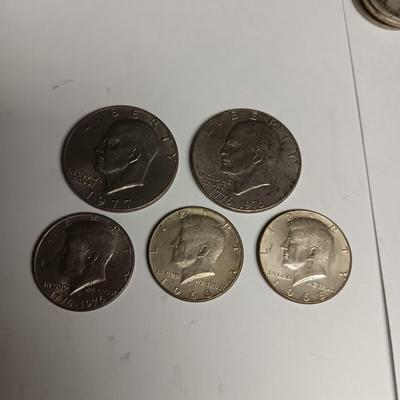 TWO EISENHOWER DOLLARS AND 3 KENNEDY HALF DOLLARS