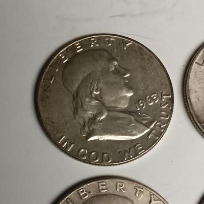THREE BENJAMIN FRANKLIN SILVER HALF DOLLARS & BARBER HEAD HALF DOLLAR