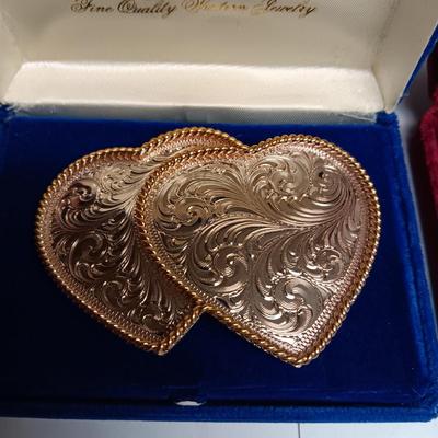 MONTANA SILVERSMITH BELT BUCKLE AND A STICK PIN