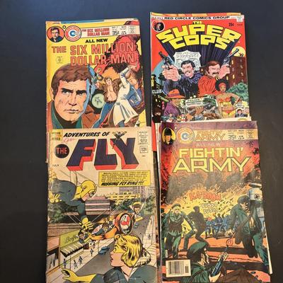 LOT 64: Vintage Comic Books: The Six Million Dollar Man,Tarzan, Space Wars, The Bionic Woman & More