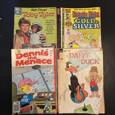 LOT 65: Comic Book Collection: Looney Tunes, Ritchie Rich, Woody Woodpecker, Popeye and More