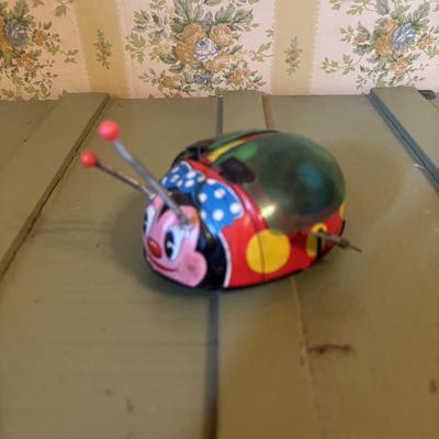 LOT 73: Vintage Toys & Plushes: Wind-up Walking Doll, Wind-up Train Station, Musical Motion Swan, Monkey "Press Here" for...