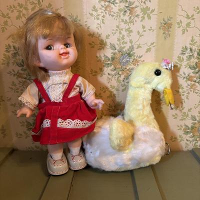 LOT 73: Vintage Toys & Plushes: Wind-up Walking Doll, Wind-up Train Station, Musical Motion Swan, Monkey "Press Here" for...