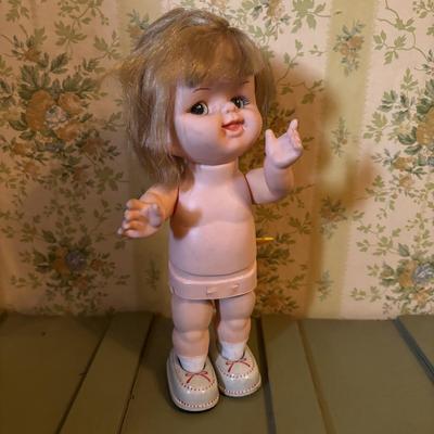 LOT 73: Vintage Toys & Plushes: Wind-up Walking Doll, Wind-up Train Station, Musical Motion Swan, Monkey "Press Here" for...