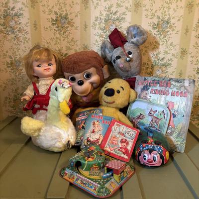 LOT 73: Vintage Toys & Plushes: Wind-up Walking Doll, Wind-up Train Station, Musical Motion Swan, Monkey "Press Here" for...