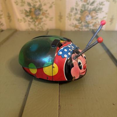 LOT 73: Vintage Toys & Plushes: Wind-up Walking Doll, Wind-up Train Station, Musical Motion Swan, Monkey "Press Here" for...