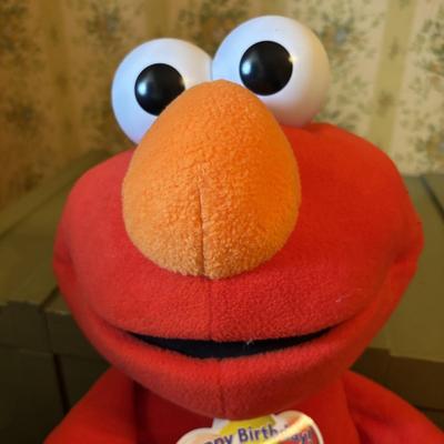 LOT 78: Toys R Us 35th Birthday Elmo, Macys Thanksgiving 2002 Kermit Frog Plush w/Camera, Macy's 2001 Curious George Macy's...