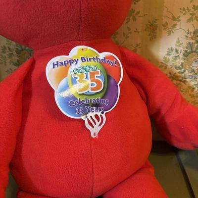 LOT 78: Toys R Us 35th Birthday Elmo, Macys Thanksgiving 2002 Kermit Frog Plush w/Camera, Macy's 2001 Curious George Macy's...