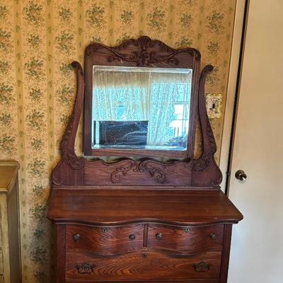 LOT 79: Anique Tiger Oak Drawer Dresser