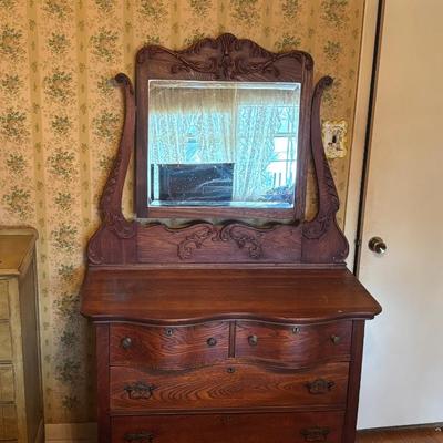 LOT 79: Anique Tiger Oak Drawer Dresser